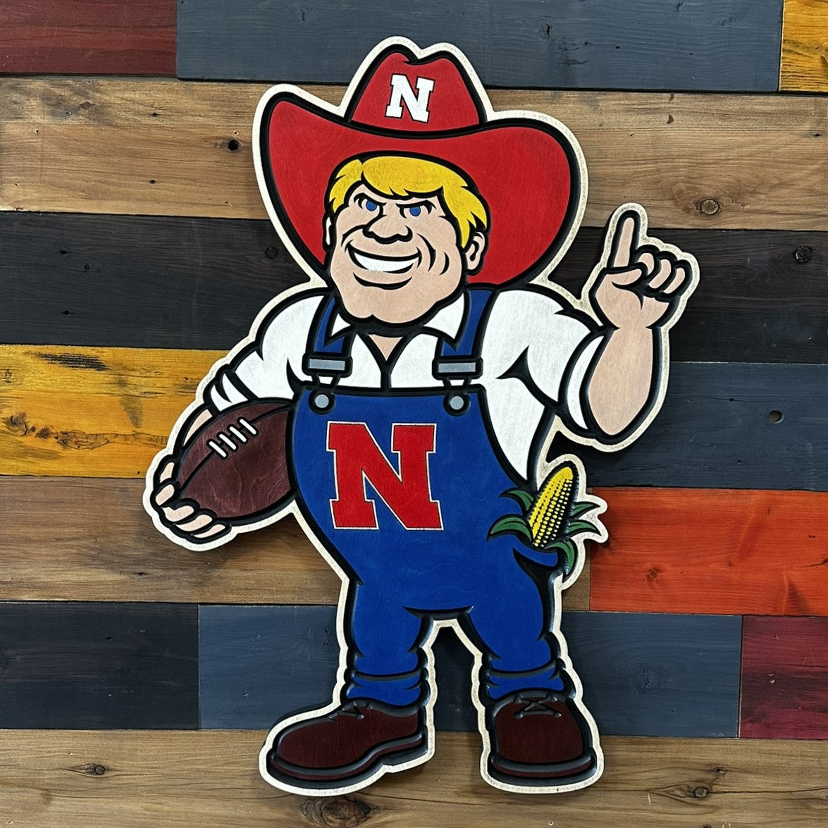 herbie husker wood sign 