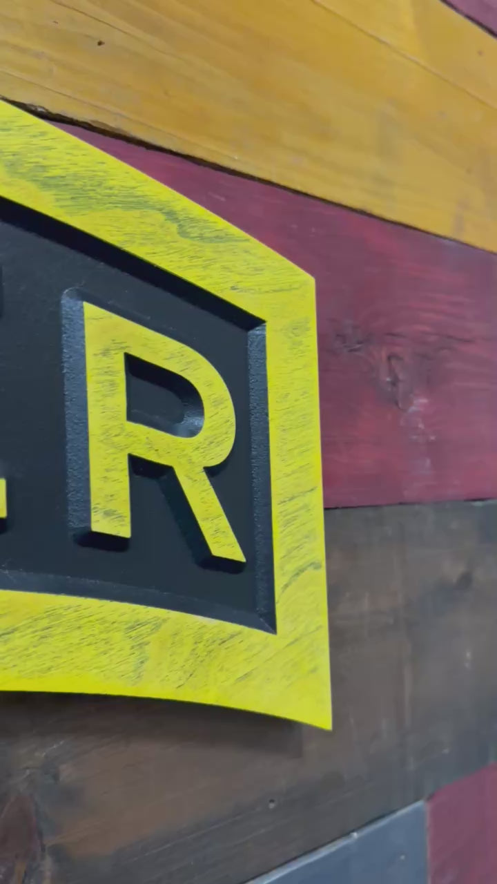 Officially licensed US Army Ranger tab carved wood wall sign showing dimensional depth and hand painted detail