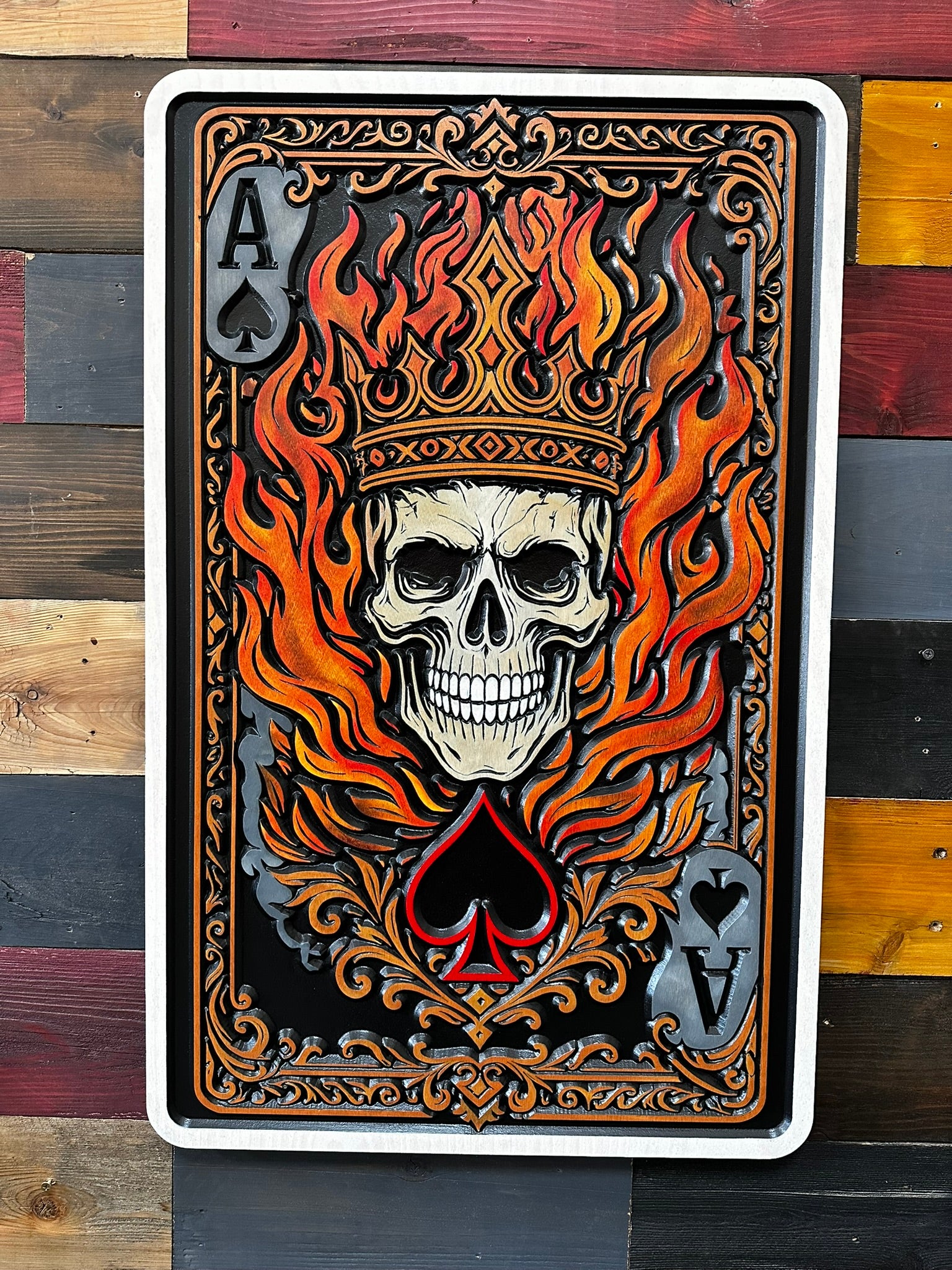Skull Ace of Spades wall art with flaming crown and ornate carved details