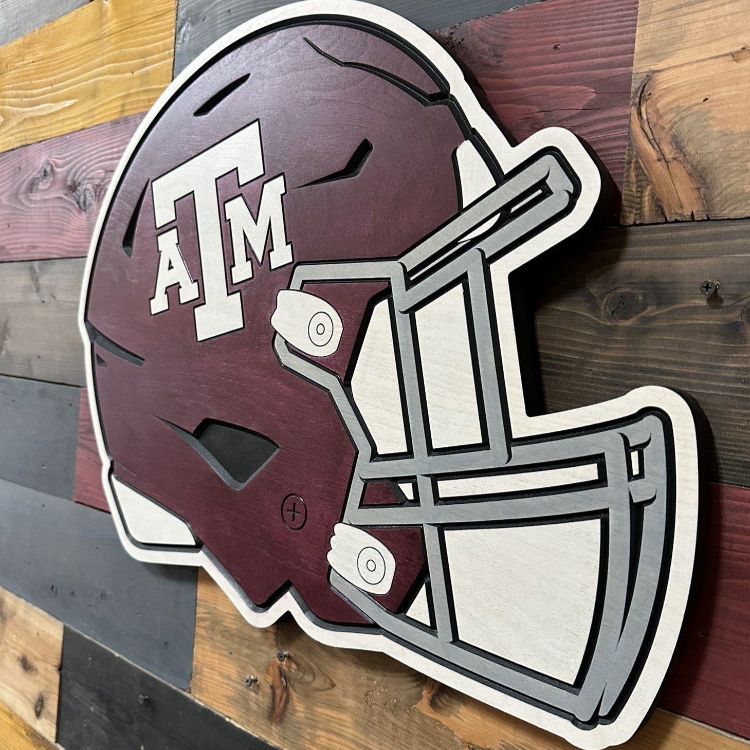 Texas A&M Aggies fan cave wall decor featuring the iconic ATM football helmet design