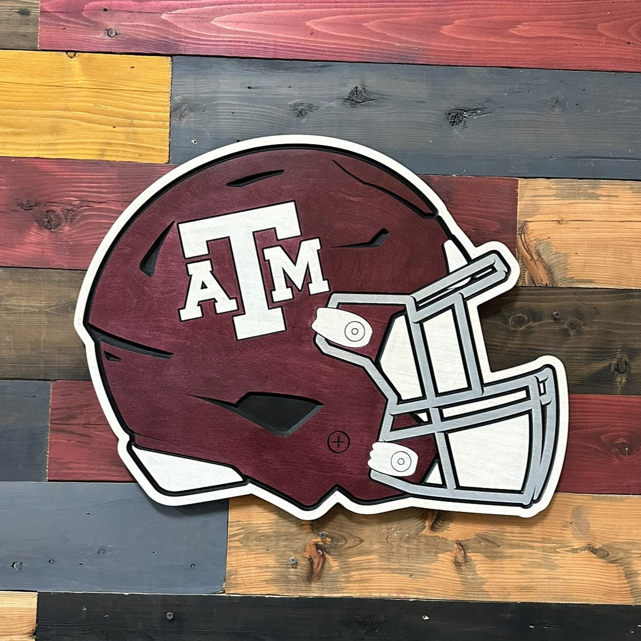 Handcrafted Texas A&M Aggies football helmet wall art featuring the official ATM logo