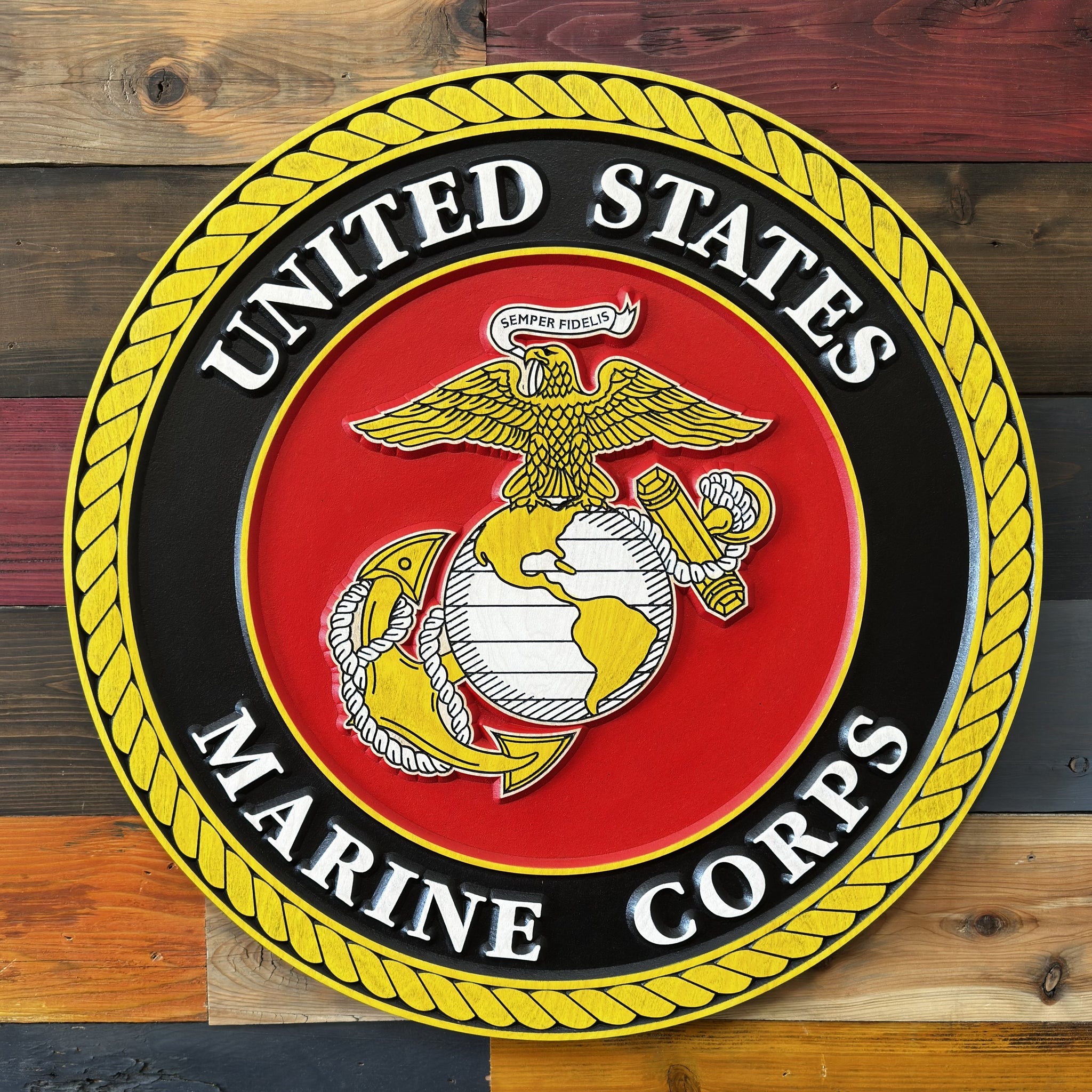 Close-up of carved United States Marine Corps emblem wood sign detail
