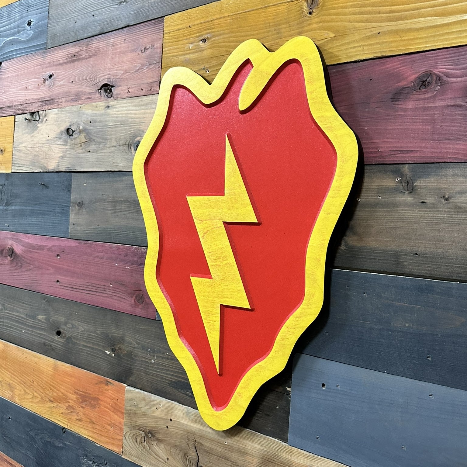 Officially licensed US Army 25th Infantry Division Tropic Lightning carved wood wall sign with red taro leaf and yellow lightning bolt