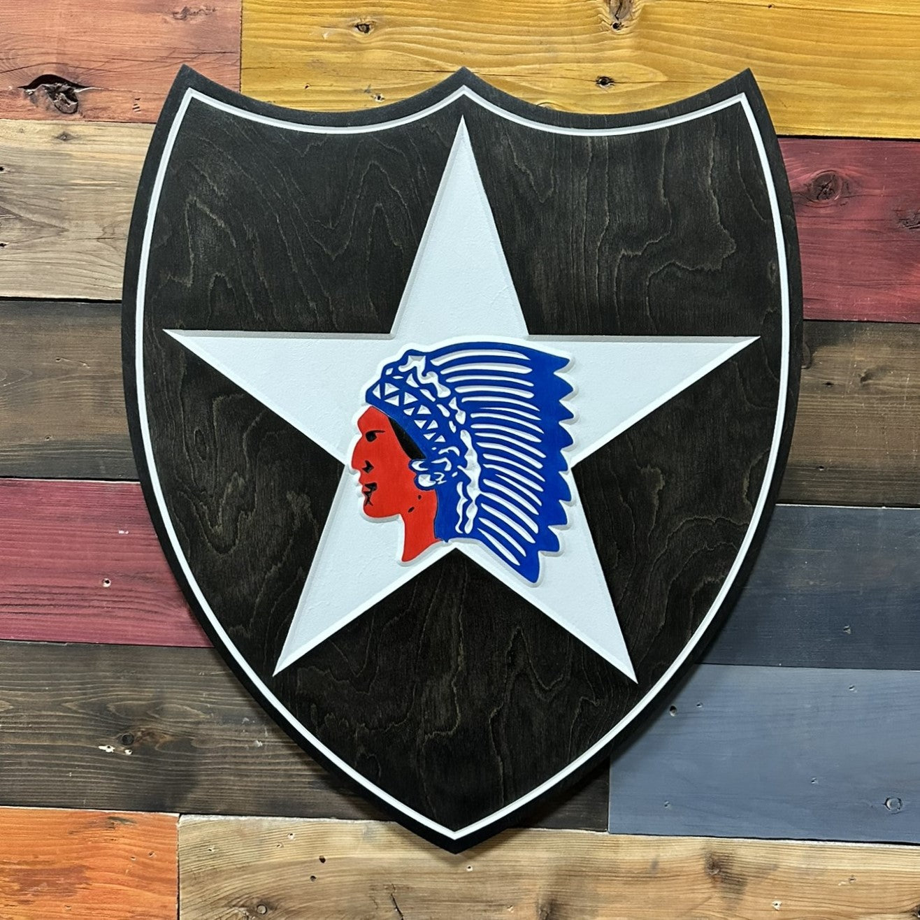 Side profile of US Army 2nd Infantry Division Indianhead carved wood wall sign showing carved thickness