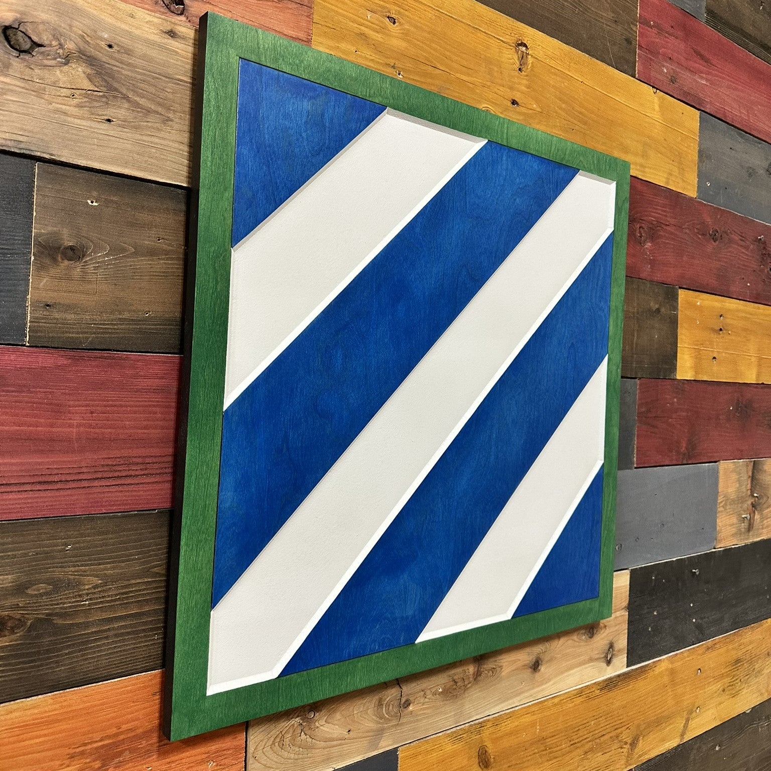 Side profile of US Army 3rd Infantry Division carved wood wall sign showing carved thickness