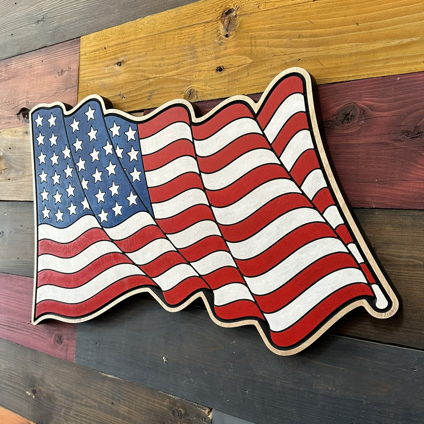 Handcrafted USA flag wood sign featuring a waving American flag design for patriotic home decor