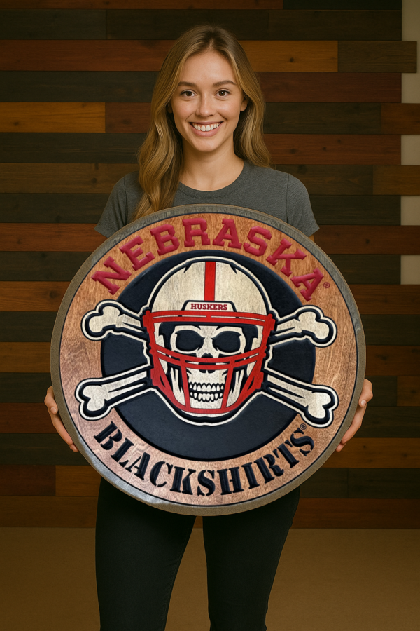 Nebraska Blackshirts round wall sign with skull and bones