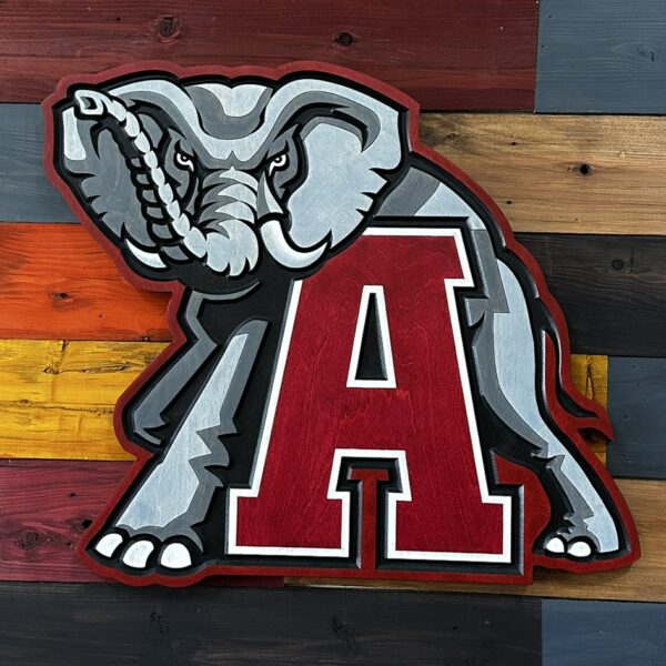 Alabama elephant behind crimson A sign by Cornbread Custom Signs